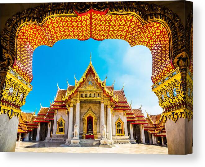 Wat Benchamabophit Canvas Print featuring the photograph The Marble Temple in Bankgok Thailand. Locally known as Wat Benchamabophit. by Kundoy