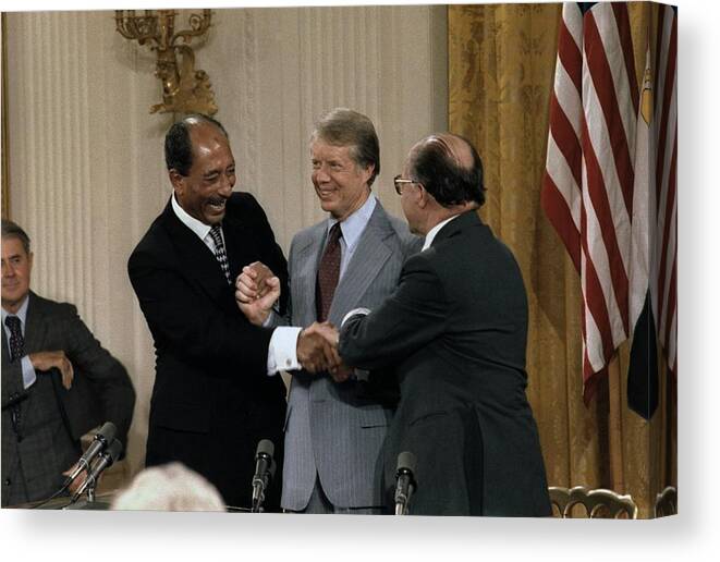 History Canvas Print featuring the photograph Anwar Sadat Jimmy Carter And Menahem #1 by Everett