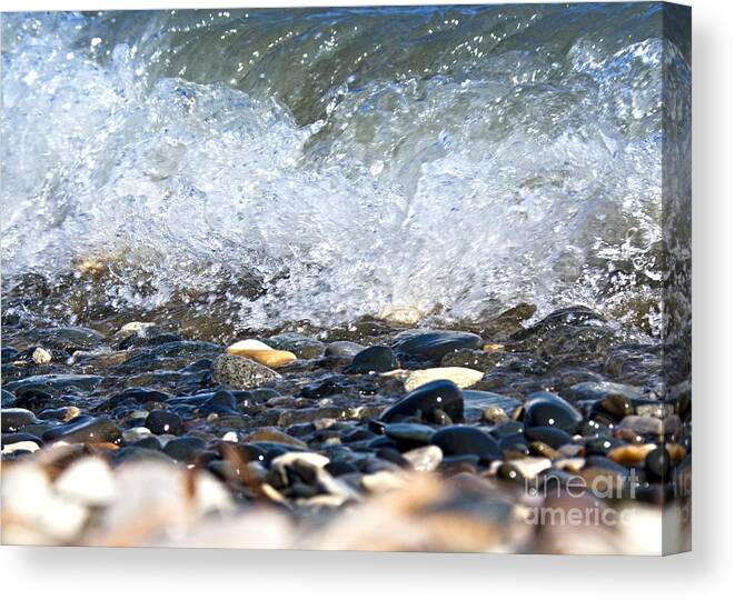 Ocean Stones Canvas Print featuring the photograph Ocean Stones #1 by Stelios Kleanthous