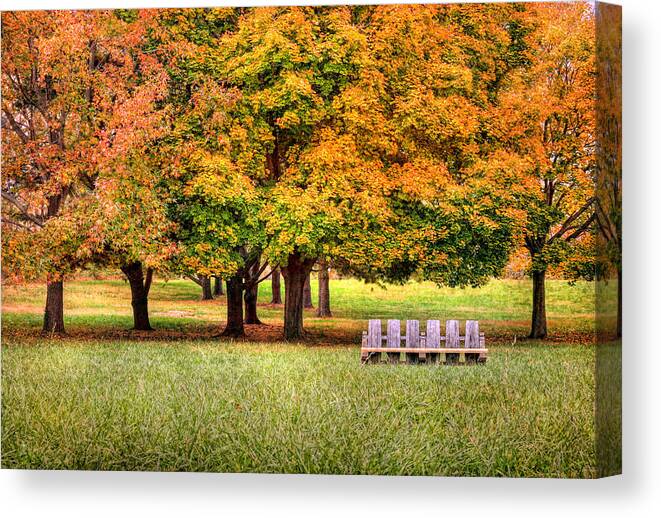 Autumn Canvas Print featuring the photograph Autumn And A Bench by Pat Abbott