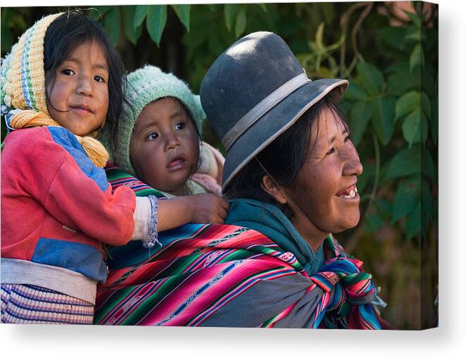 Women Canvas Print featuring the photograph Aymara women with their children. Republic of Bolivia. by Eric Bauer