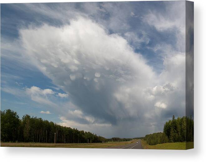 Huge Canvas Print featuring the photograph Huge Cloud Yellowhead by David Kleinsasser