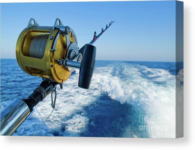 Rod and reel on board of game fishing boat Canvas Print