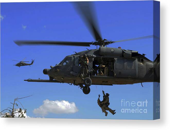 Pararescue Canvas Print featuring the photograph U.s. Air Force Pararescuemen by Stocktrek Images