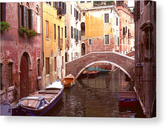 Pastels Canvas Print featuring the photograph Venice Bridge over a Small Canal. by Tom Wurl
