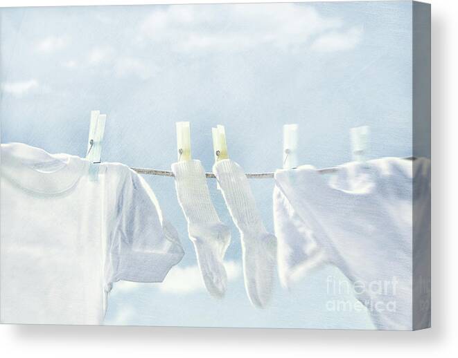 Air Canvas Print featuring the photograph Clothes hanging on clothesline #1 by Sandra Cunningham