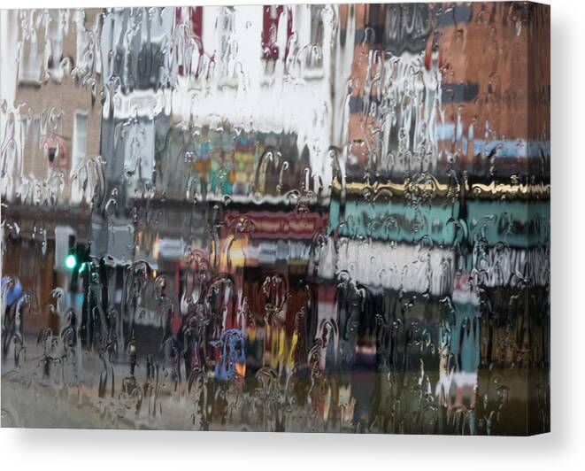 Ireland Canvas Print featuring the photograph Dublin in the rain. by Rob Huntley