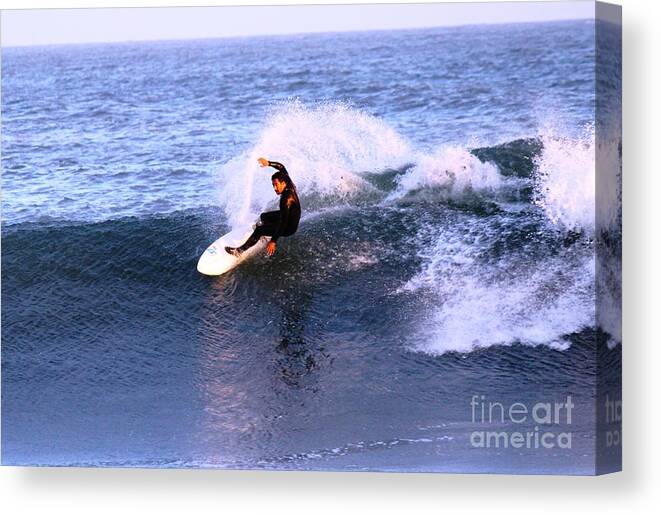 Surfing Canvas Print featuring the photograph Action images by Donn Ingemie