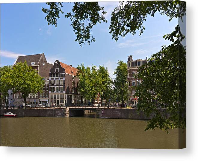 Netherlands; Amsterdam; Canal; Gabled House; Water; Tourism; Travel; Vacation; Holiday; Boat; Ship; Vessel Canvas Print featuring the photograph Amsterdam canal view by Johan Elzenga