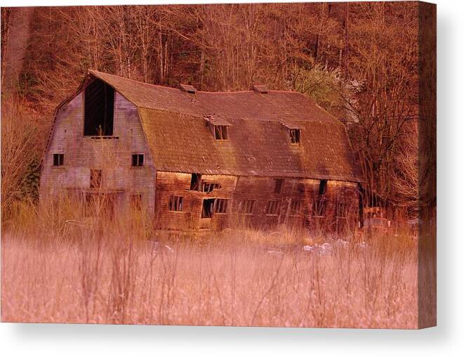Barns Canvas Print featuring the photograph An Old Dairy Barn by Jeff Swan
