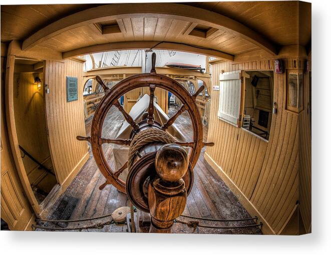 Helm Canvas Print featuring the photograph Behind the Helm by Fred LeBlanc