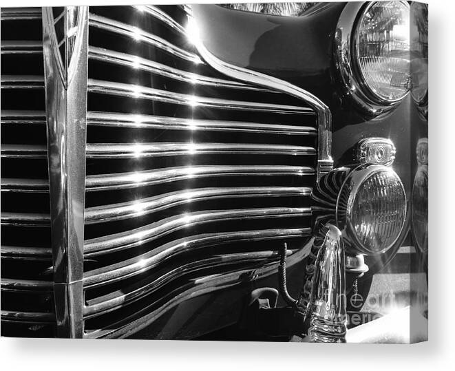 Cars Canvas Print featuring the photograph Classic Cars - 1941 Chevy Special Deluxe Business Coupe - grille and headlight - black and white by Jason Freedman