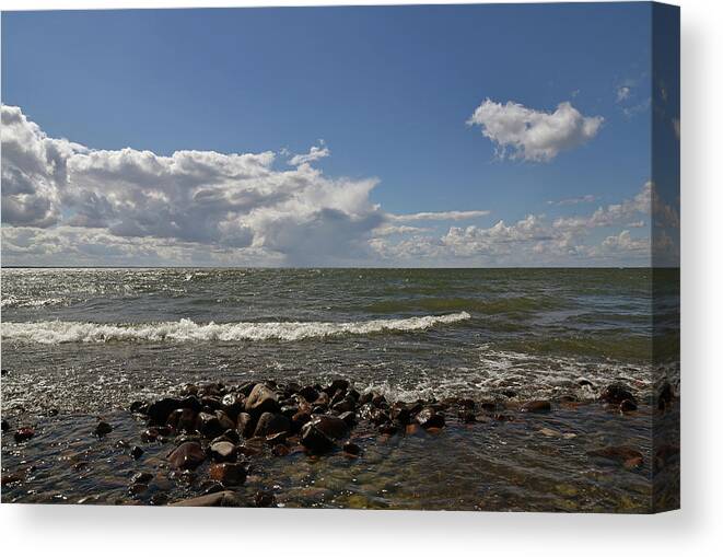 Sweden Canvas Print featuring the pyrography Clouds over sea by Magnus Haellquist