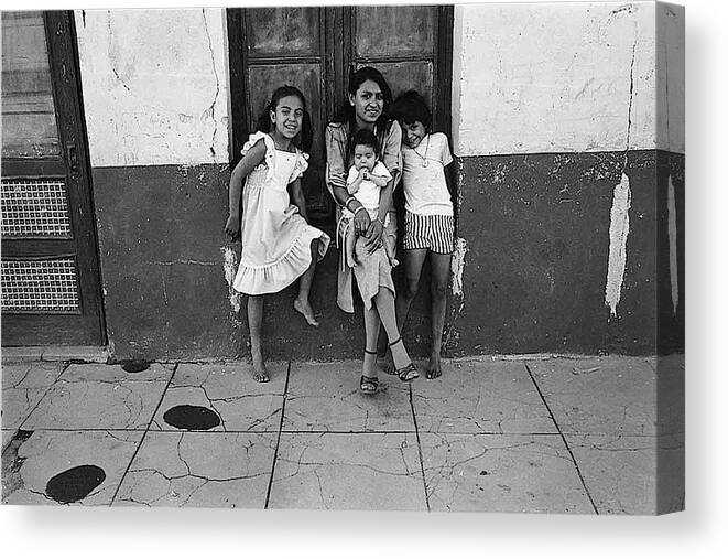 Family Along A Wall Us Mexico Border Town Naco Sonora Mexico 1980 Canvas Print featuring the photograph Family along a wall US Mexico border town Naco Sonora Mexico 1980 by David Lee Guss