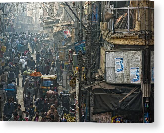 Street Canvas Print featuring the photograph In Pursuit Of A Living by Prateek Dubey