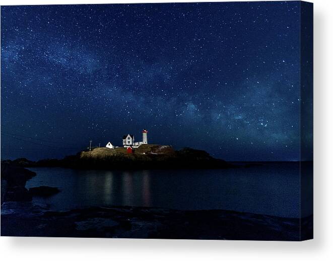 Milky Way Canvas Print featuring the photograph Light up Nubble Lighthouse by Darryl Hendricks
