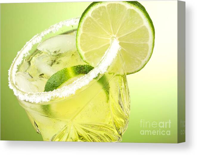 Lime Canvas Print featuring the photograph Lime cocktail drink by Blink Images