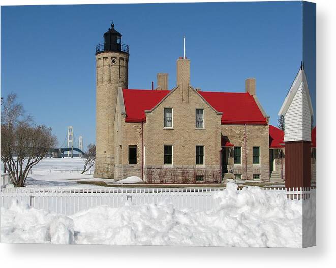 Old Mackinac Point Canvas Print featuring the photograph Mackinac Bridge and Light by Keith Stokes