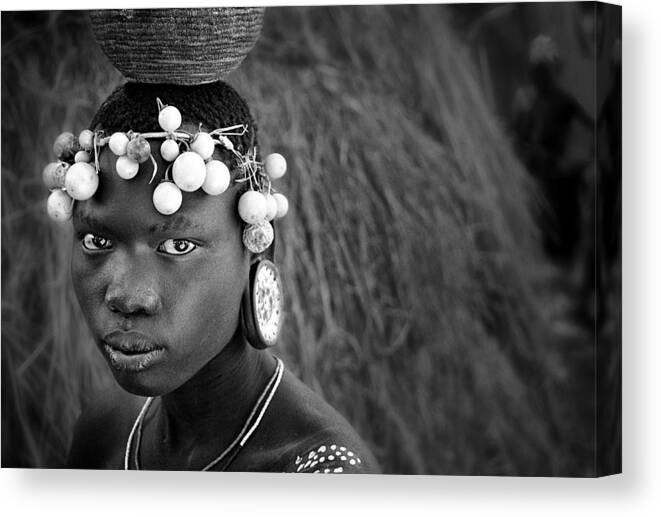 Mursi Canvas Print featuring the photograph Mursi Woman by Marc Apers