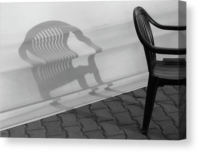 Chair Shadow Canvas Print featuring the photograph Plastic Chair Shadow 2 by Prakash Ghai