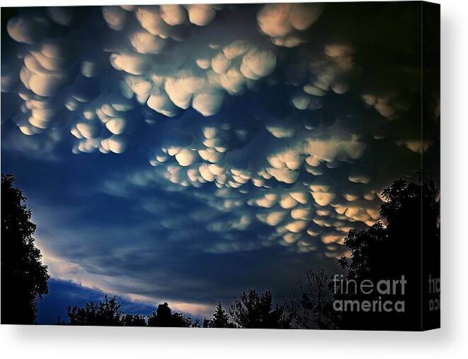 Frank-j-casella Canvas Print featuring the photograph Puffy Storm Clouds by Frank J Casella