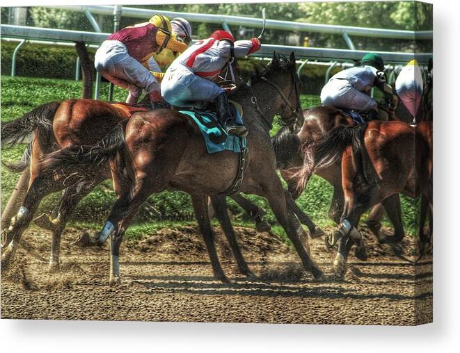 Race Horses Canvas Print featuring the photograph Racing by Jeffrey PERKINS
