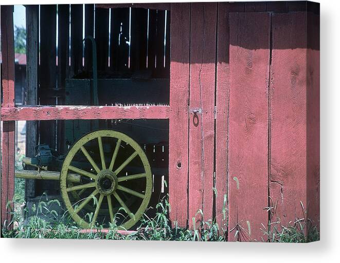 Amish Canvas Print featuring the pyrography Red Barn and Wagon Wheel by DArcy Evans