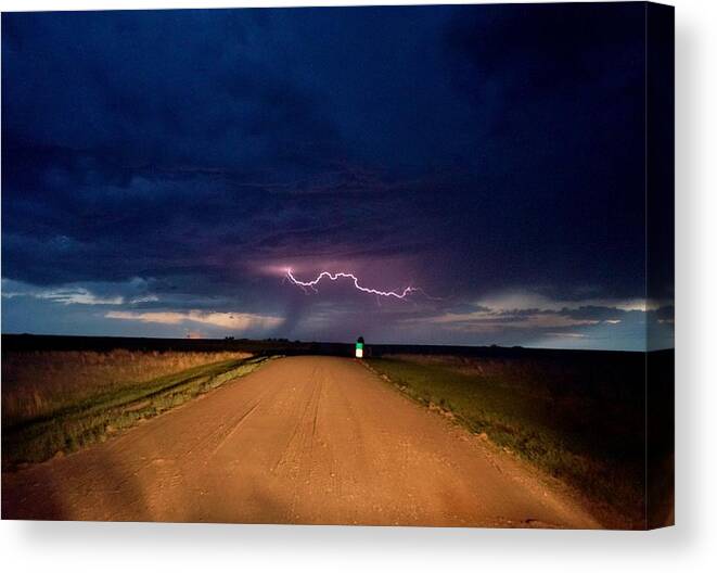 Lightning Canvas Print featuring the photograph Road Under the Storm by Ed Sweeney