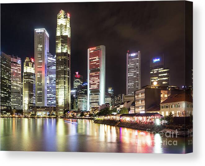 Boat Quay Canvas Print featuring the photograph Singapore by night by Didier Marti