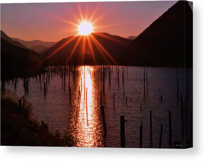 Montana Canvas Print featuring the photograph Starburst Sunrise - Earthquake Lake 005 by George Bostian