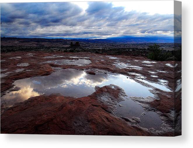 Reflection Canvas Print featuring the photograph Stormy Sunrise by Harry Spitz