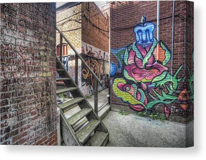 Graffiti Canvas Print featuring the photograph The Alley by Jim Pearson