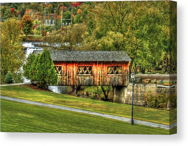 Covered Bridge Canvas Print featuring the photograph The Kissing Bridge by Evelina Kremsdorf