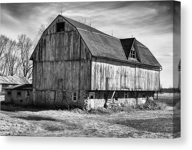 Monochrome Canvas Print featuring the photograph The Old Barn by John Roach