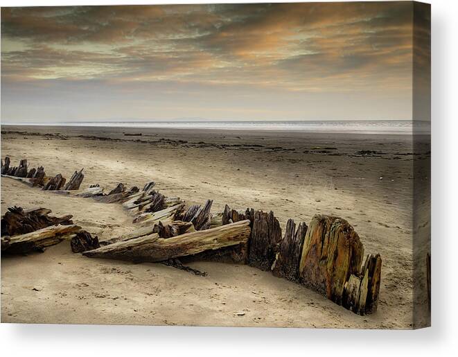 Wood Canvas Print featuring the photograph The Shipwreck on Pendine Sands, Wales. by Colin Allen