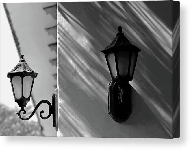 Minimal Canvas Print featuring the photograph Two Lamps by Prakash Ghai