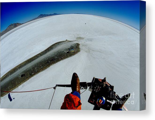 Boots Canvas Print featuring the photograph Ultralight Aircraft flying over the Bonneville Salt Flats by Wernher Krutein