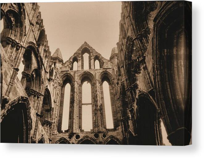 Whitby Abbey England Sepia Old Medieval Middle Ages Church Monastery Nun Nuns Architecture York Yorkshire Monasteries Ruins Saint Century Black Death Building  Cathedral Cloister Feudal Benedictine Monk Monks Celtic Bram Stoker Dracula Canvas Print featuring the photograph Whitby Abbey #19 by Raymond Magnani