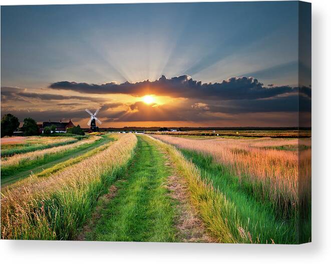 Windmill Canvas Print featuring the photograph Windmill At Sunset by Meirion Matthias