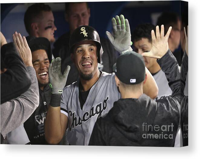 People Canvas Print featuring the photograph Chicago White Sox V Toronto Blue Jays by Tom Szczerbowski