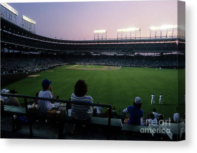 1980-1989 Canvas Print featuring the photograph Philadelphia Phillies V Chicago Cubs by Jonathan Daniel