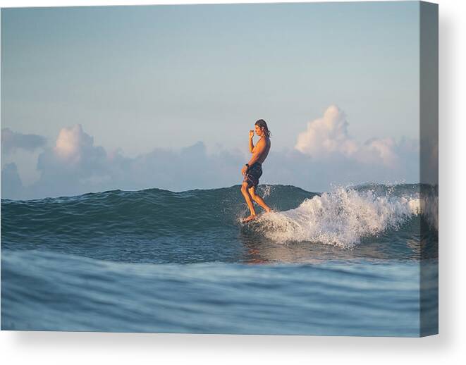 Surf Canvas Print featuring the photograph Surfing The Sunrise In Costa Rica #21 by Cavan Images