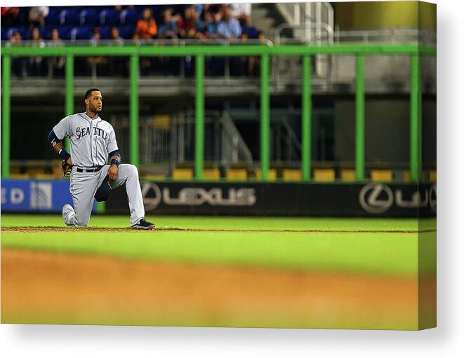 American League Baseball Canvas Print featuring the photograph Seattle Mariners V Miami Marlins by Mike Ehrmann