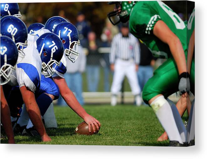 Sports Helmet Canvas Print featuring the photograph American Football Line Of Scrimmage by Groveb
