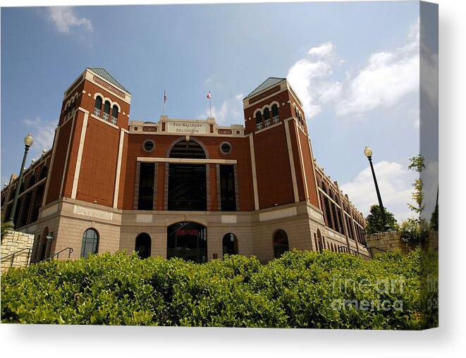American League Baseball Canvas Print featuring the photograph Ameriquest And Texas Rangers Strike by Ronald Martinez