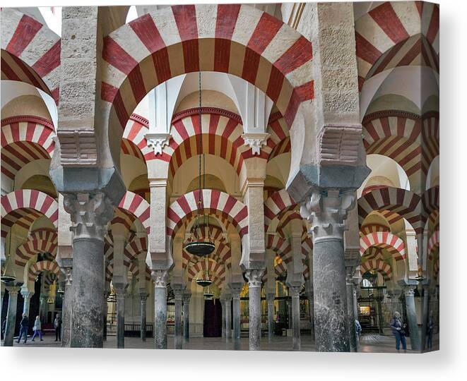 Arch Canvas Print featuring the photograph Arches Inside Mezquita At Cordoba by Izzet Keribar