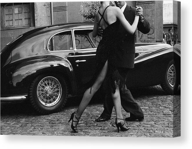 Heterosexual Couple Canvas Print featuring the photograph Argentina, Couple Dancing Tango By Car by Christopher Pillitz