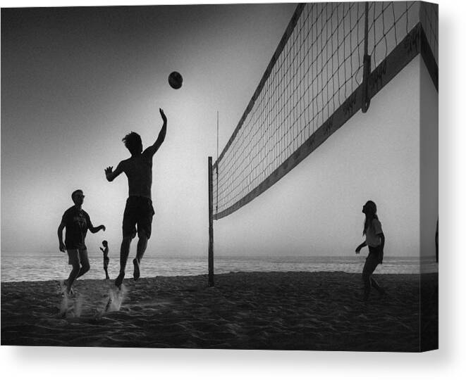 Action Canvas Print featuring the photograph Beach Volleyball by Leah Guo