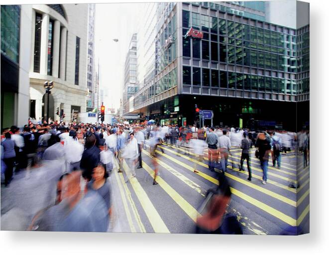 Working Canvas Print featuring the photograph Blurred Image Of Hong Kong Central by Medioimages/photodisc