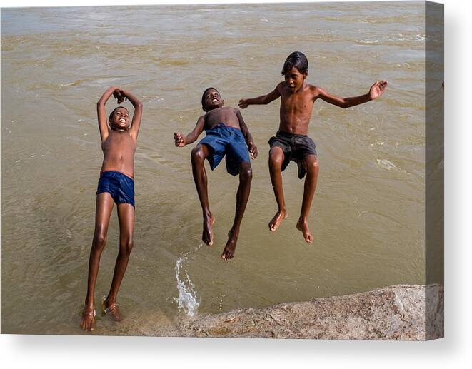 Travel Canvas Print featuring the photograph Boys Jump by Shreenivas Yenni